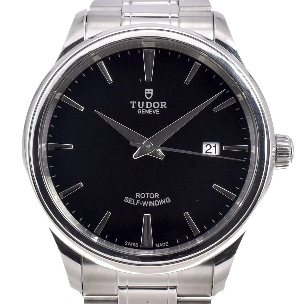 TUDOR STYLE DATE BLACK DIAL AUTOMATIC WATCH: Tudor Style Date Black Dial Automatic Watch Brand: TUDOR Type/Style: Wristwatch Material: Band Material Stainless Steel, Case Material Stainless Steel Color: Case Color Silver, Band Color Silver,