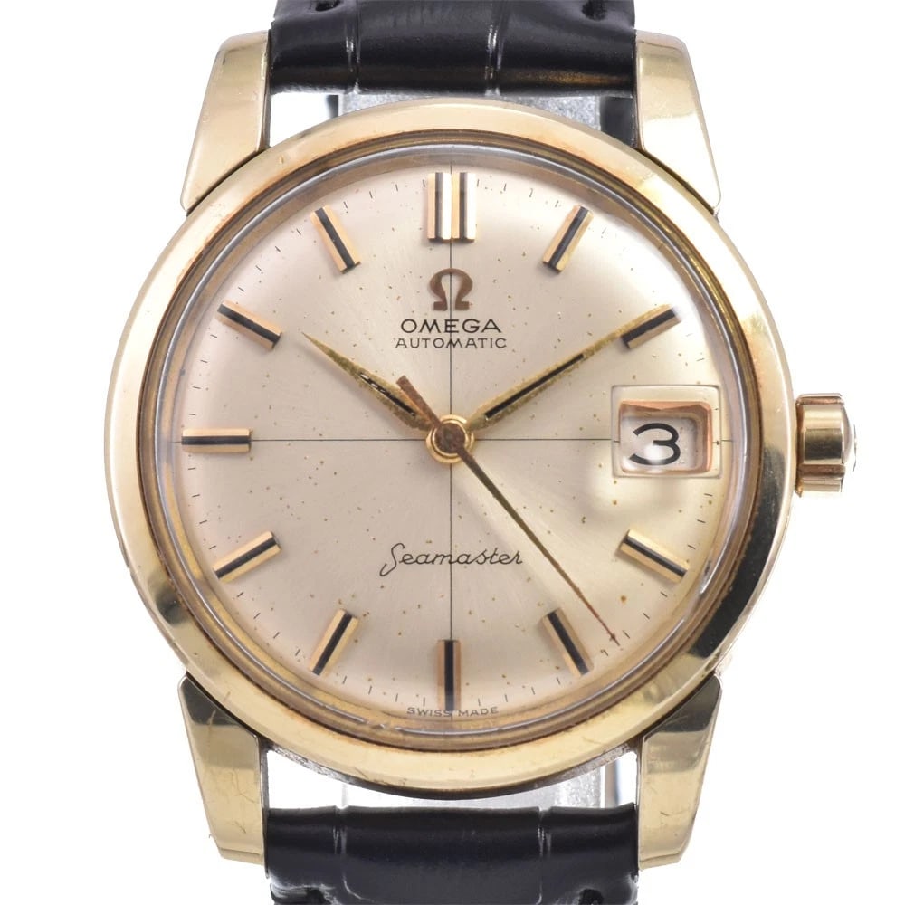 OMEGA SEAMASTER DATE CAP GOLD WATCH: Omega Seamaster Date Cap Gold Watch Brand: OMEGA Type/Style: Wristwatch Material: Band Material leather, Case Material Stainless Steel/Gold Plated Color: Case Color gold, Band Color black, Dial Color