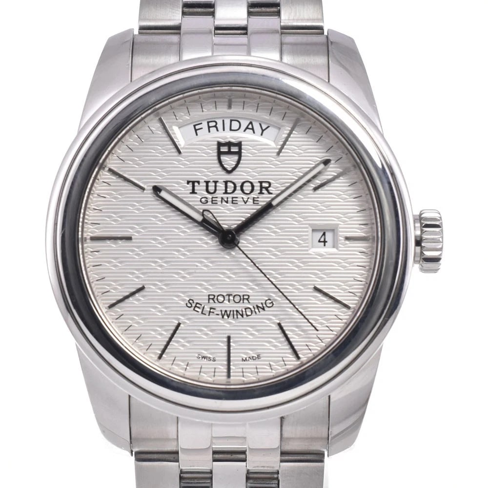 TUDOR GLAMOR DATE DAY AUTOMATIC WATCH: Tudor Glamor Date Day Automatic Watch Brand: TUDOR Type/Style: Wristwatch Material: Band Material Stainless Steel, Case Material Stainless Steel Color: Case Color Silver, Band Color Silver, Dial Color