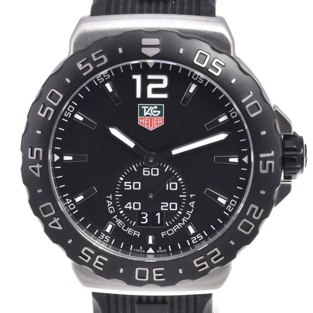 TAG HEUER FORMULA DATE BLACK DIAL QUARTZ WATCH: Tag Heuer Formula Date Black Dial Quartz Watch Brand: TAG HEUER Type/Style: Wristwatch Material: Band Material rubber, Case Material Stainless Steel Color: Case Color Silver, Band Color black, Dial