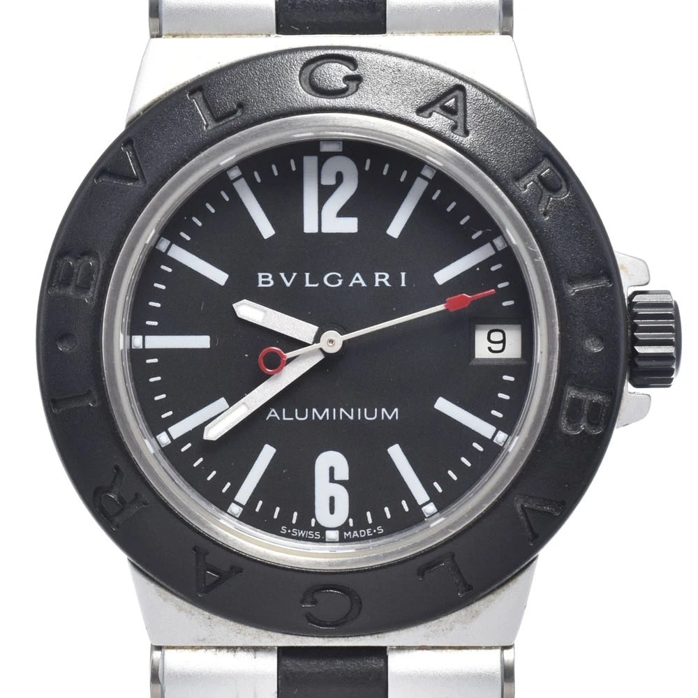 BVLGARI ALUMINUM DATE BLACK DIAL QUARTZ UNISEX WATCH: Bvlgari Aluminum Date Black Dial Quartz Unisex Watch Brand: BVLGARI Type/Style: Wristwatch Material: Band Material rubber, Case Material aluminum Color: Case Color Silver, Band Color black, Dial Color