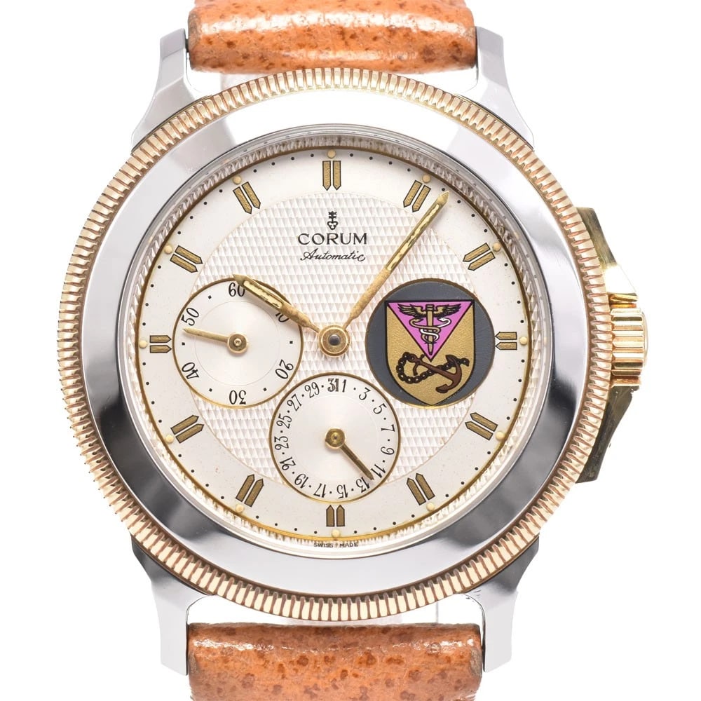 CORUM TEMP MECHANIC DATE SILVER DIAL WATCH: Corum Temp Mechanic Date Silver Dial Watch Brand: CORUM Type/Style: Wristwatch Material: Band Material leather, Case Material Stainless Steel Color: Case Color Silver, Band Color Brown, Dial Color Sil