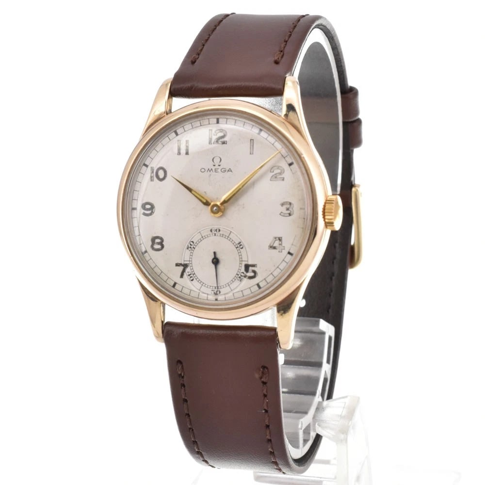 OMEGA K9YG SILVER DIAL AUTOMATIC WATCH: Omega K9Yg Silver Dial Automatic Watch Brand: OMEGA Type/Style: Wristwatch Material: Band Material leather, Case Material K9YG Color: Case Color Yellow Gold, Band Color Brown, Dial Color Silver Size: