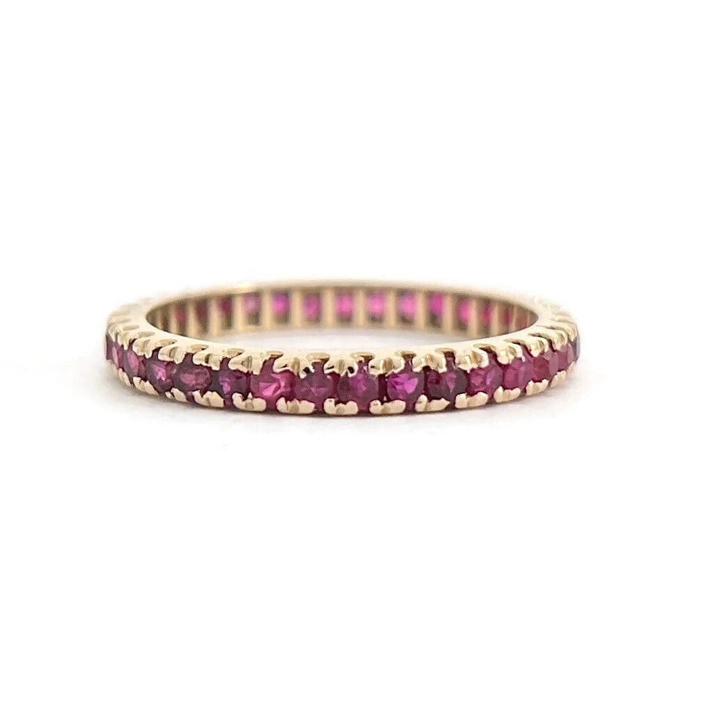 ESTATE RUBY GEMSTONE ETERNITY RING 14K YELLOW GOLD: Estate Ruby Gemstone Eternity Ring 14K Yellow Gold Brand: Unbranded Type/Style: Ring Material: 14K Yellow Gold, Main Stone Natural Color: Pink Size: 7.75 US Accessories: None Accessories N