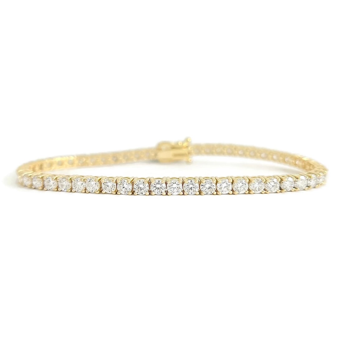ROUND LAB-CREATED DIAMOND TENNIS BRACELET 14K YELLOW GOLD: Round Lab-Created Diamond Tennis Bracelet 14K Yellow Gold Brand: Unbranded Type/Style: Bracelet Material: 14K Yellow Gold, Main Stone Lab-Created Color: Gold Size: Length: 7 inches Width: 3.3 mm A