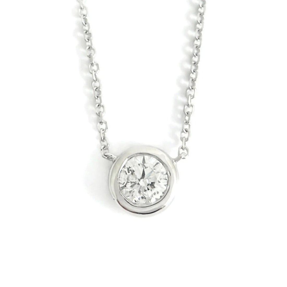 ROUND BEZEL SOLITAIRE DIAMOND PENDANT NECKLACE 14K WHITE GOLD: Round Bezel Solitaire Diamond Pendant Necklace 14K White Gold Brand: Salvatore & Co. Type/Style: Necklace Material: 14K White Gold, Main Stone Natural Color: White Size: Length: 15 inches Pendant: 9.2