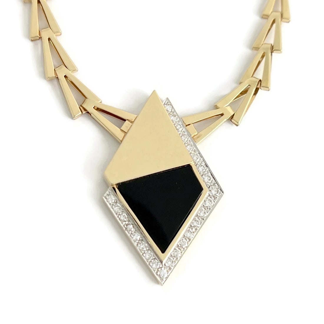 BLACK ONYX DIAMOND GEOMETRIC PENDANT NECKLACE 14K YELLOW GOLD: Black Onyx Diamond Geometric Pendant Necklace 14K Yellow Gold Brand: Estate Type/Style: Necklace Material: 14K Yellow Gold, Main Stone Natural Color: Gold Size: Length: 16 inches Pendant: 1.75 inches 