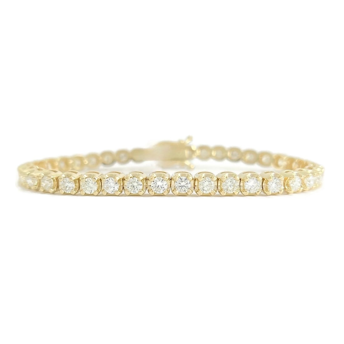 ROUND DIAMOND BUTTERCUP TENNIS BRACELET 14K YELLOW GOLD: Round Diamond Buttercup Tennis Bracelet 14K Yellow Gold Brand: Unbranded Type/Style: Bracelet Material: 14K Yellow Gold, Main Stone Natural Color: Gold Size: Length: 7 inches Width: 4.7 mm Accesso