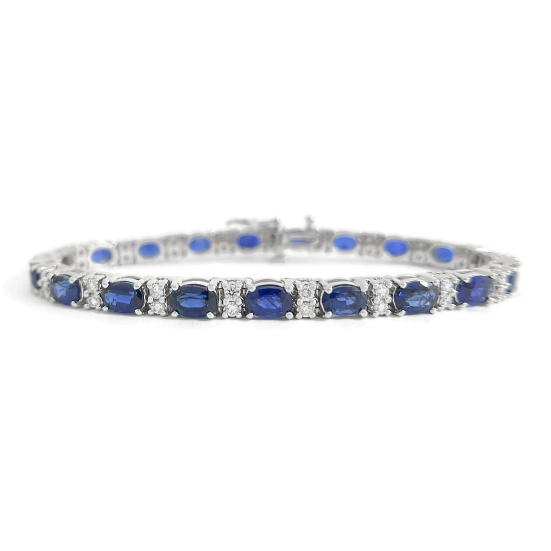 OVAL BLUE SAPPHIRE DIAMOND GEMSTONE TENNIS BRACELET 14K WHITE GOLD: Oval Blue Sapphire Diamond Gemstone Tennis Bracelet 14K White Gold Brand: Unbranded Type/Style: Bracelet Material: 14K White Gold, Main Stone Natural Color: Blue Size: Length: 7 inches Width: 4.8 mm