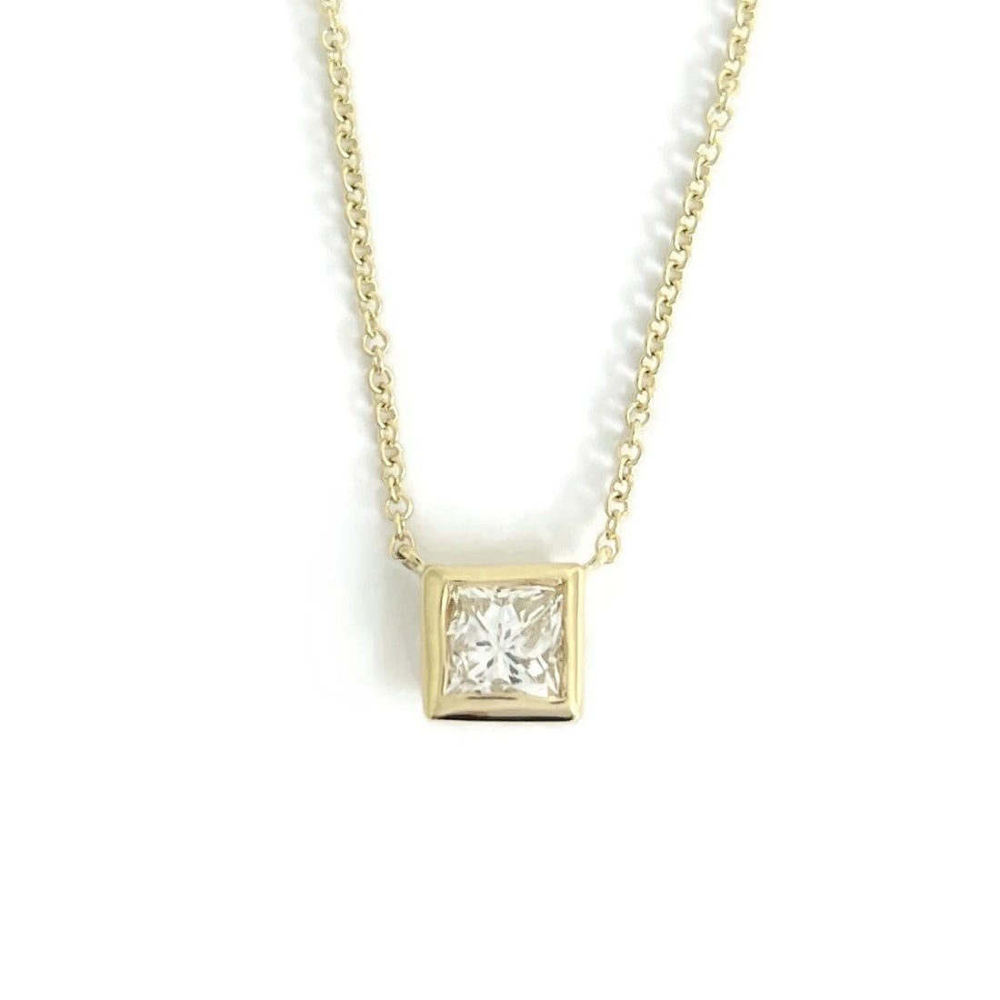 PRINCESS PENDANT NECKLACE 14K YELLOW GOLD: Princess Pendant Necklace 14K Yellow Gold Brand: Salvatore & Co. Type/Style: Necklace Material: 14K Yellow Gold, Main Stone Natural Color: Gold Size: Length: 16 inchesPendant: 5.8 mm x 5.9 mm Acce