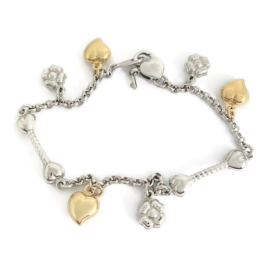 ITALIAN TWO-TONE HEART FLOWER CHARM BRACELET 14K WHITE AND YELLOW GOLD: Italian Two-Tone Heart Flower Charm Bracelet 14K White and Yellow Gold Brand: Estate Type/Style: Bracelet Material: 14K White and Yellow Gold, Color: Silver Size: Length: 7 inchesCharms: 8 mm wide (he