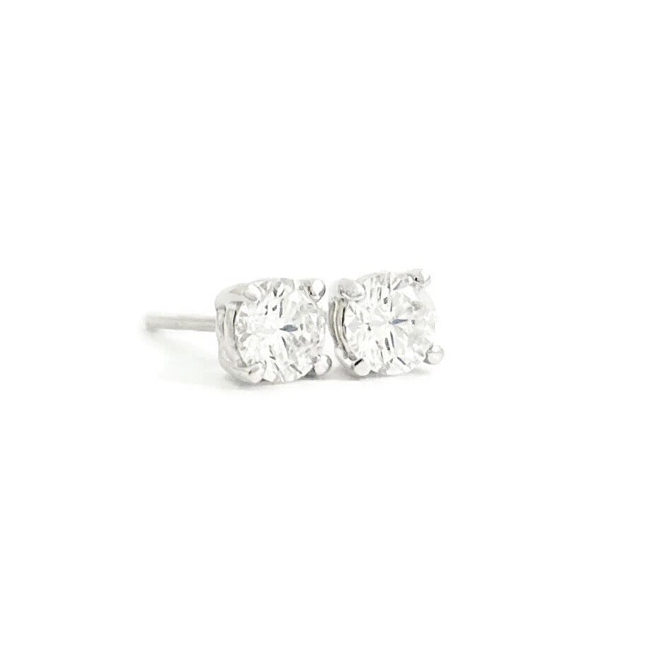 ROUND DIAMOND STUD EARRINGS 14K WHITE GOLD: Round Diamond Stud Earrings 14K White Gold Brand: Unbranded Type/Style: Earrings Material: 14K White Gold, Main Stone Natural Color: White Size: Measurements: 4 mm Accessories: None Access