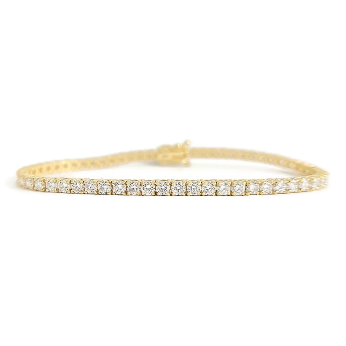 ROUND LAB-CREATED DIAMOND TENNIS BRACELET 14K YELLOW GOLD: Round Lab-Created Diamond Tennis Bracelet 14K Yellow Gold Brand: Unbranded Type/Style: Bracelet Material: 14K Yellow Gold, Main Stone Lab-Created Color: Gold Size: Length: 7 inchesWidth: 3 mm Acce
