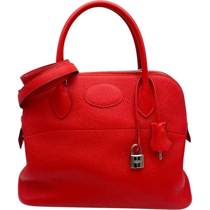 HERMES BOLIDE 31 X STAMP ROUGE TOMATE TAURILLON SHOULDER BAG: HERMES Bolide 31 X Stamp Rouge Tomate Taurillon Shoulder Bag Brand: HERMES Type/Style: Shoulder Bag Material: Taurillon Color: Rouge Tomato SV Hardware Size: W: 31cm / H: 24cm / D: 12cm Accessorie
