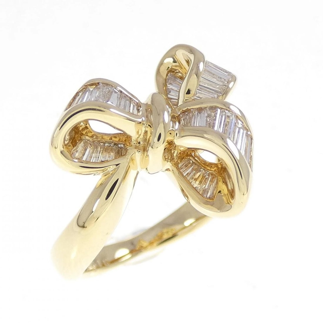 K18YG RIBBON DIAMOND RING: K18YG Ribbon Diamond Ring Brand: Unbranded Type/Style: Diamond Ring Material: K18YG, Color: YG Size: US3 Accessories: None Accessories Notice: When purchasing pre-owned goods, please refer