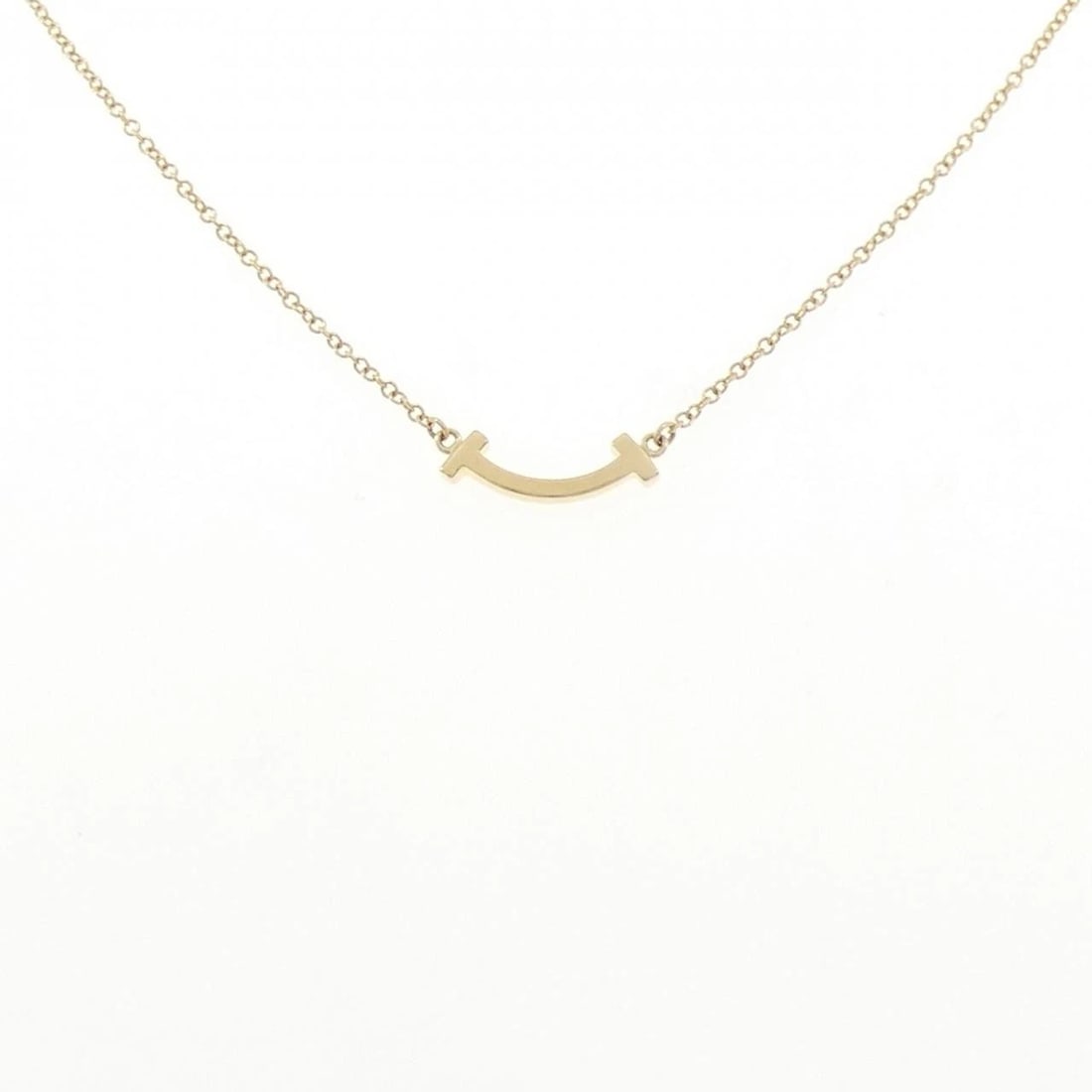 TIFFANY & CO. T SMILE MINI NECKLACE: TIFFANY & Co. T Smile Mini Necklace Brand: TIFFANY&Co. Type/Style: TIFFANY&Co. Necklace Material: 750 yellow gold, Color: yellow gold Size: 41?46cm Pendant length approx. x width approx.: