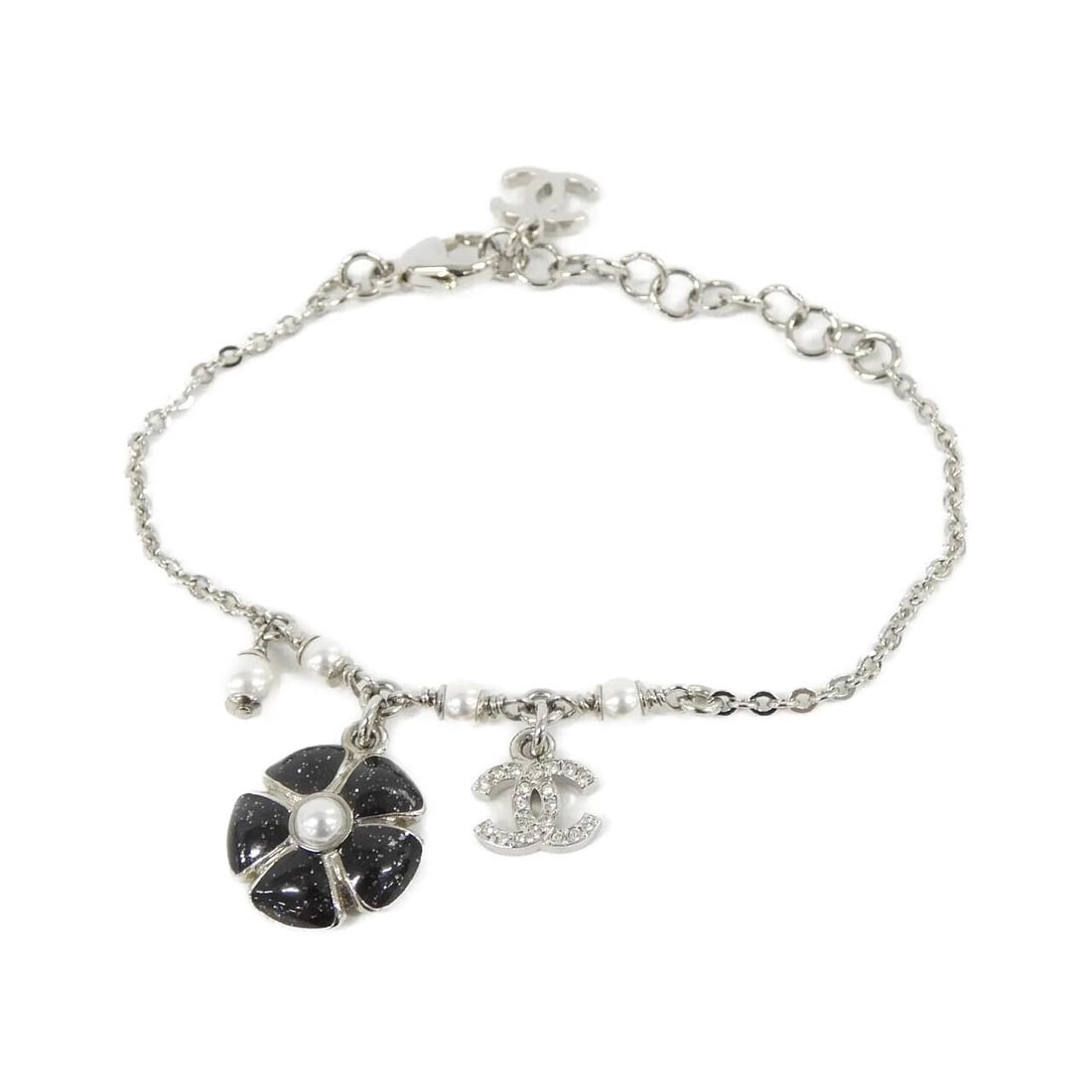 CHANEL FAKE PEARL BRACELET: Chanel Fake pearl Bracelet Brand: CHANEL Type/Style: Chanel Bracelet Material: Fake pearl, Color: Black+White+Crystal / Silver Metal Size: Length: 16-20mm cm Motif width x height: 1.7mm cm x 2mm cm