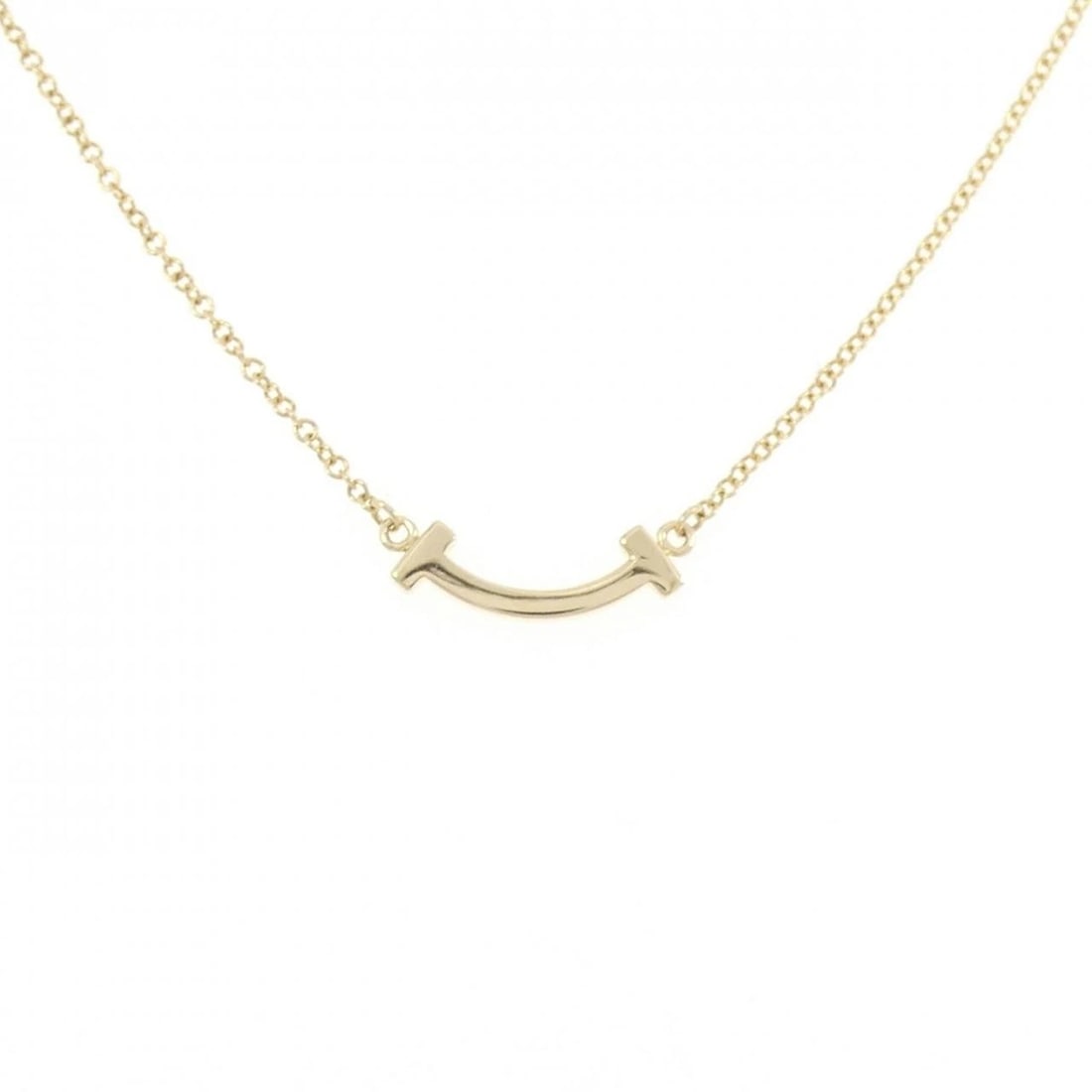TIFFANY & CO. T SMILE MINI NECKLACE: TIFFANY & Co. T Smile Mini Necklace Brand: TIFFANY&Co. Type/Style: TIFFANY&Co. Necklace Material: 750 yellow gold, Color: yellow gold Size: 41?46cm Pendant length approx. x width approx.: 3.5mmx13.3mm