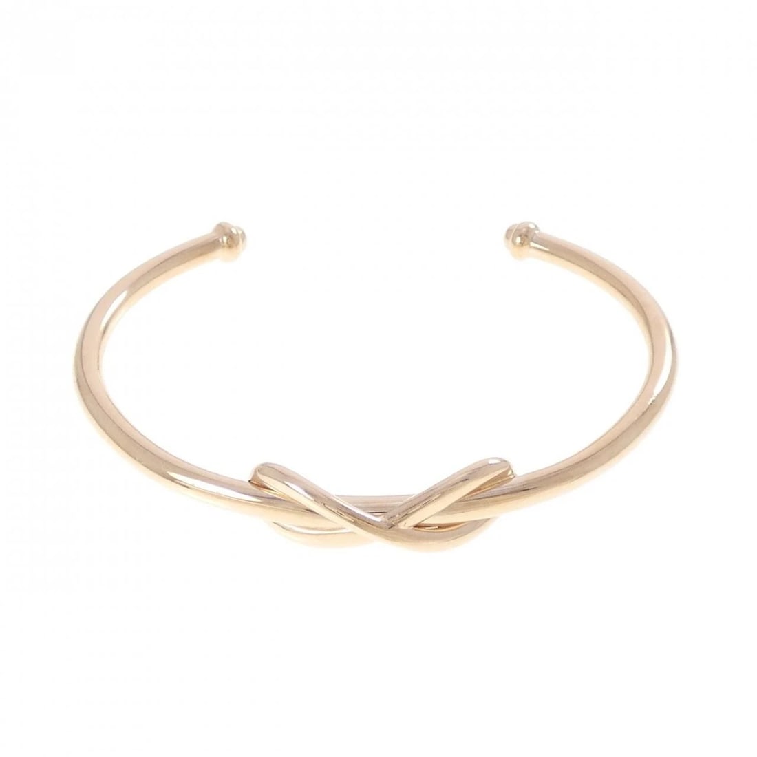 TIFFANY & CO. INFINITY BANGLE: TIFFANY & Co. Infinity Bangle Brand: TIFFANY&Co. Type/Style: TIFFANY & Co. Bracelet Material: 750 Pink Gold, Color: Pink Gold Size: 15cm Max width approx: 7.5mm Accessories: None Accessori