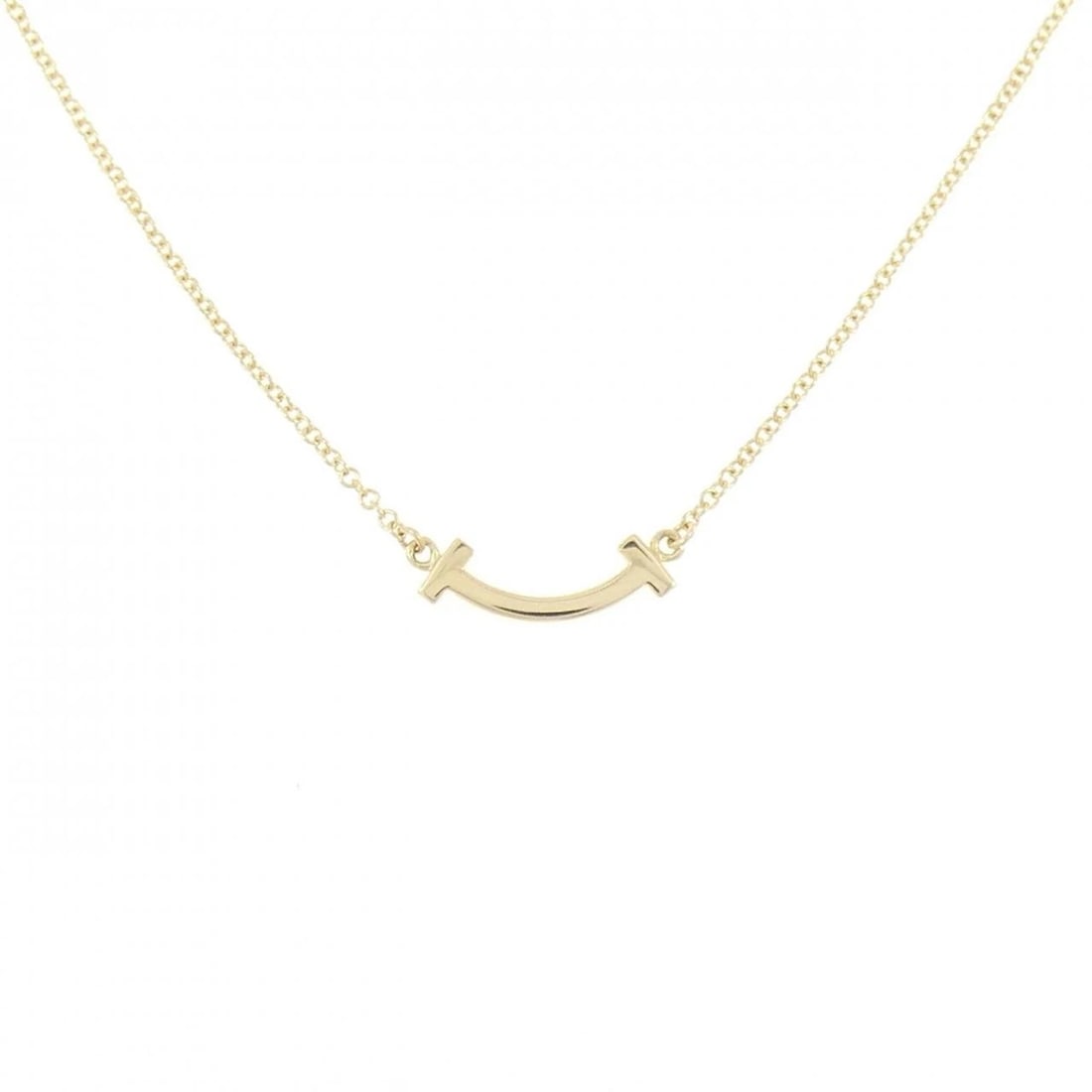TIFFANY & CO. T SMILE MINI NECKLACE: TIFFANY & Co. T Smile Mini Necklace Brand: TIFFANY&Co. Type/Style: TIFFANY&Co. Necklace Material: 750 yellow gold, Color: yellow gold Size: 40?46cm Pendant length approx. x width approx.: 3.5mmx13.2mm