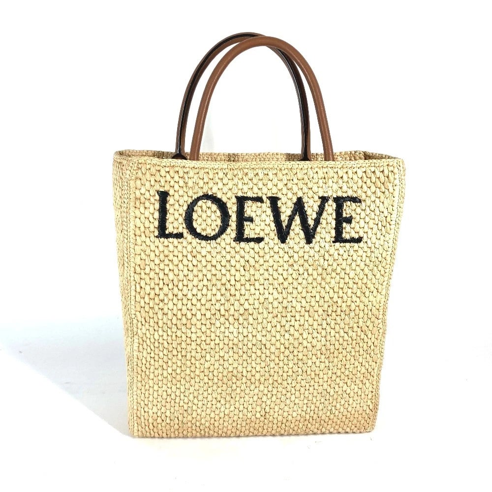 LOEWE LOGO STANDARD VERTICAL 2WAY BAG SHOULDER BAG: LOEWE logo Standard vertical 2WAY Bag Shoulder Bag Brand: LOEWE Type/Style: Tote Bag Material: Raffia Color: Beige x Brown Size: W10.6xH13.0xD2.8inch / W27cmxH33cmxD7cm Accessories: None Accessories