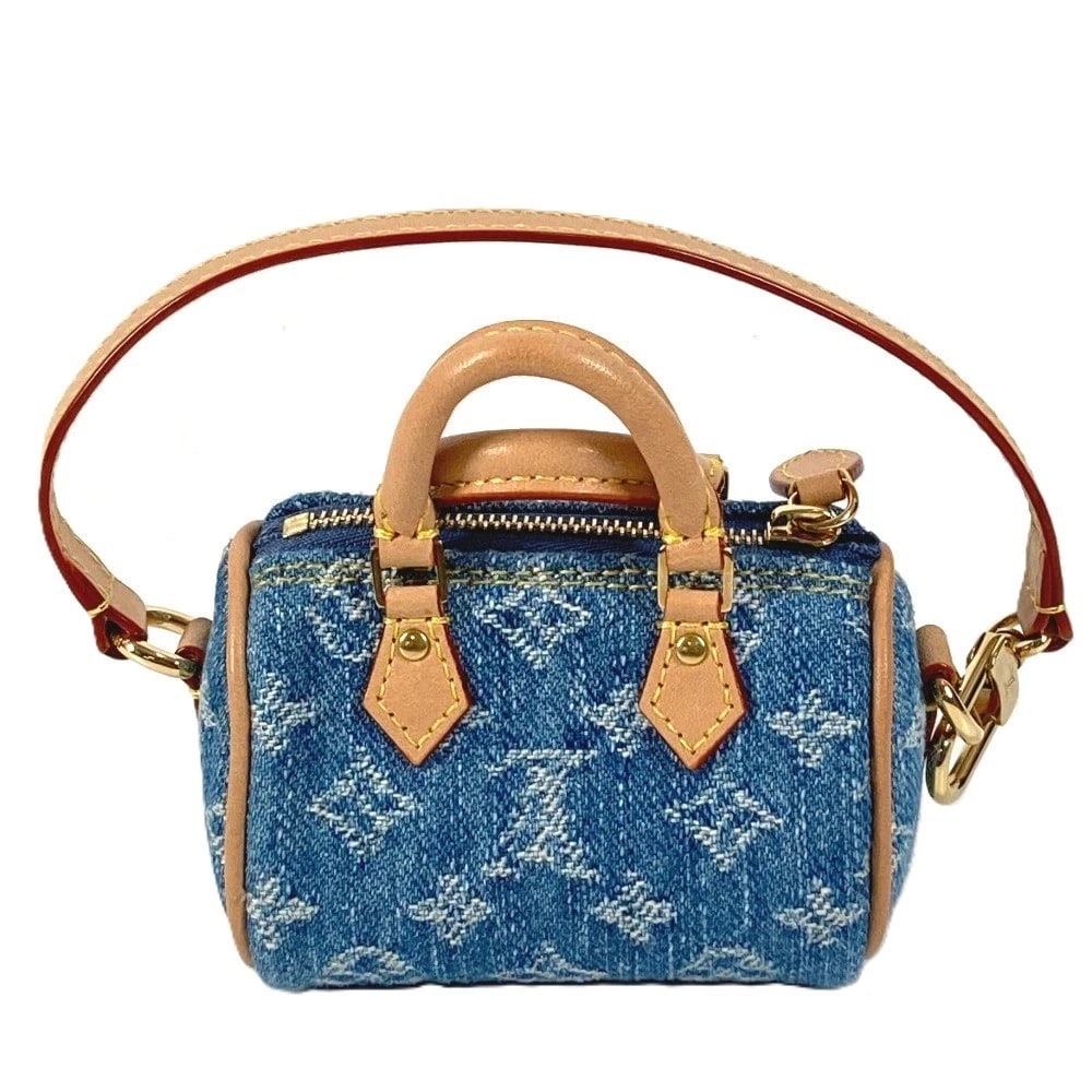 LOUIS VUITTON MONOGRAMDENIM BIJOUX SAC MICRO SPEEDY BAG: LOUIS VUITTON MonogramDenim Bijoux Sac Micro Speedy Bag Brand: LOUIS VUITTON Type/Style: Key Holder Material: Monogram Denim Color: blue Size: W3.1xH2.2inch / W8cmxH5.5cm Total Length: 3.1inch / 8cm