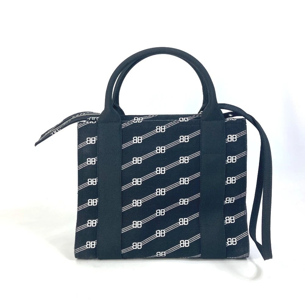BALENCIAGA BB TRADE S TOTE BAG HAND BAG: BALENCIAGA BB Trade S Tote Bag Hand Bag Brand: BALENCIAGA Type/Style: Hand Bag Material: Canvas Color: Black/White Size: W10.8xH8.7xD5.1inch / W27.5cmxH22cmxD13cm Accessories: None Accessories