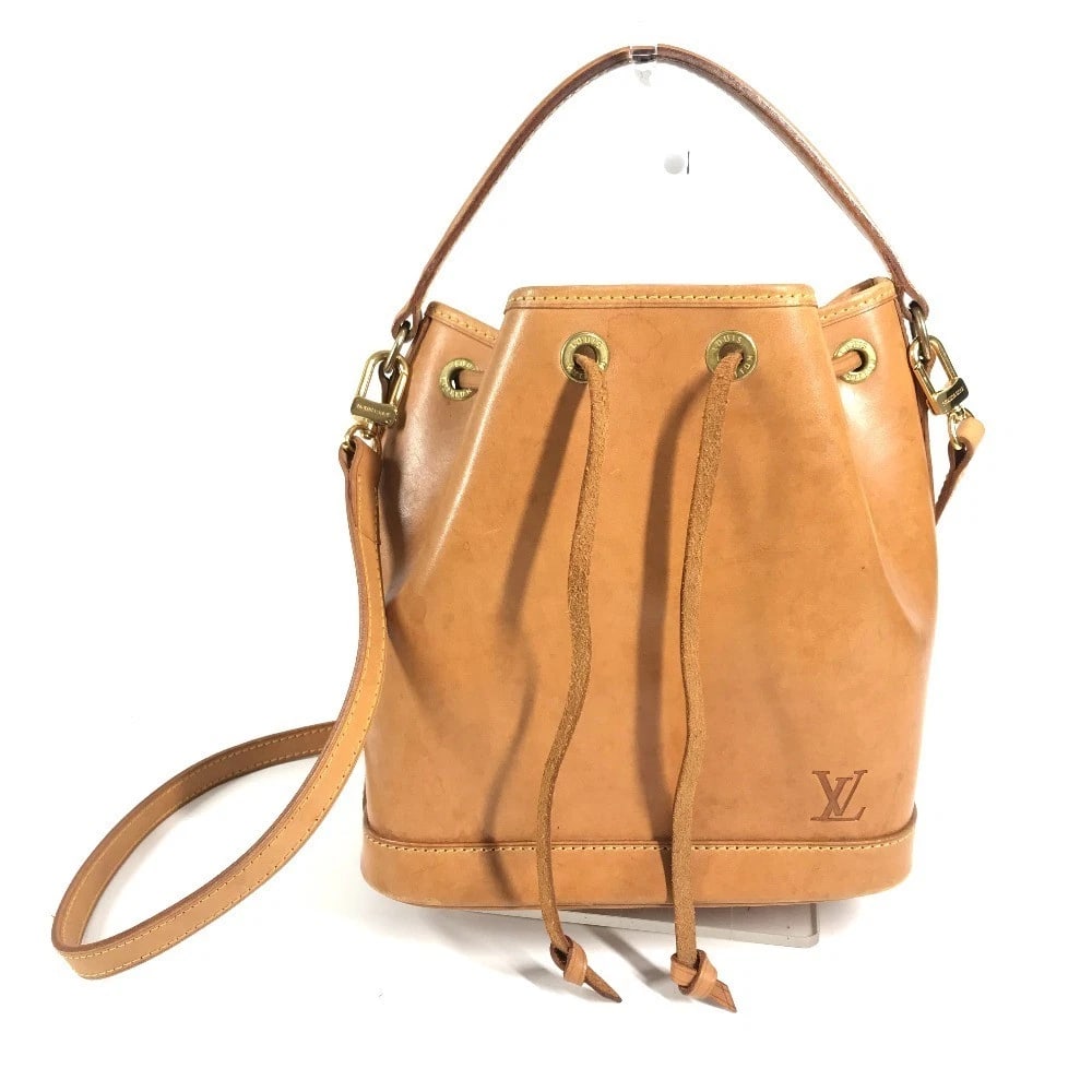 LOUIS VUITTON NOMAD MINI NOE 15TH ANNIVERSARY BUCKET HANDBAG: LOUIS VUITTON Nomad Mini Noe 15th Anniversary Bucket Handbag Brand: Louis Vuitton Type/Style: Shoulder Bag Material: Nomad leather Color: Beige Size: W8.3xH8.9xD6.1inch / W21cmxH22.5cmxD15.5cm