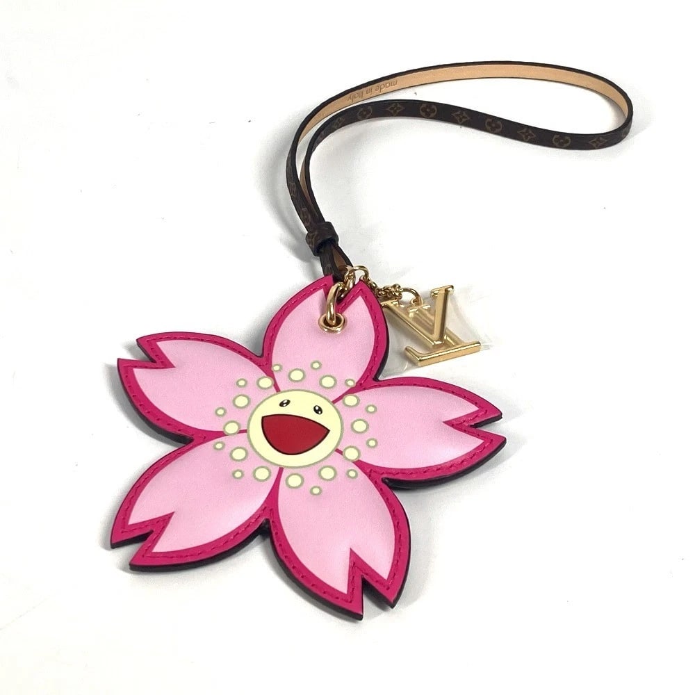 LOUIS VUITTON MONOGRAM TAKASHI MURAKAMI BAG: LOUIS VUITTON Monogram Takashi Murakami Bag Brand: LOUIS VUITTON Type/Style: Bag Charm Material: MonogramCanvas Color: brown / pink Size: Total Length: 10.2inch / 26cm Accessories: None Ac