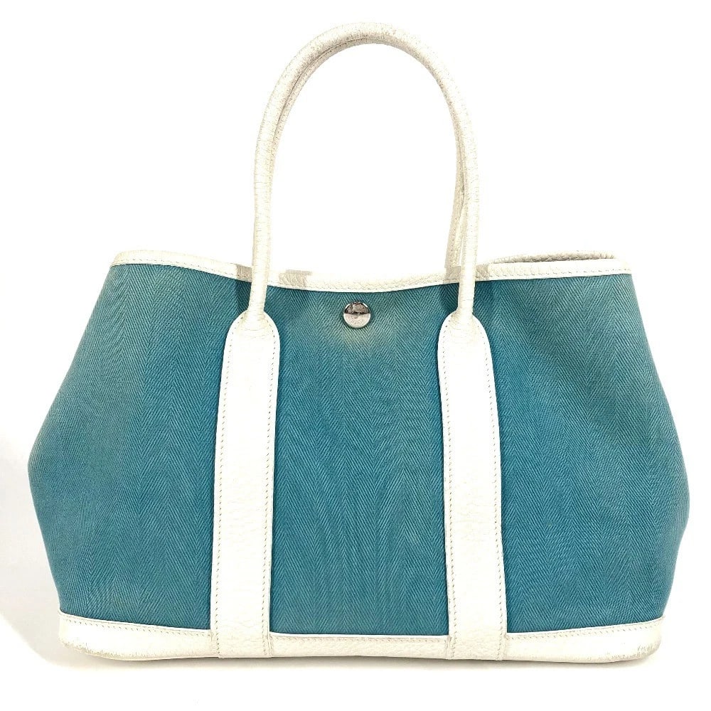 HERMES GARDEN PARTY TPM HAND BAG TOTE BAG: HERMES Garden Party TPM Hand Bag Tote Bag Brand: HERMES Type/Style: Tote Bag Material: Toile Offishe/Leather Color: Blue x white Size: W11.8xH7.9xD5.3inch / W30cmxH20cmxD13.5cm Accessories: None <