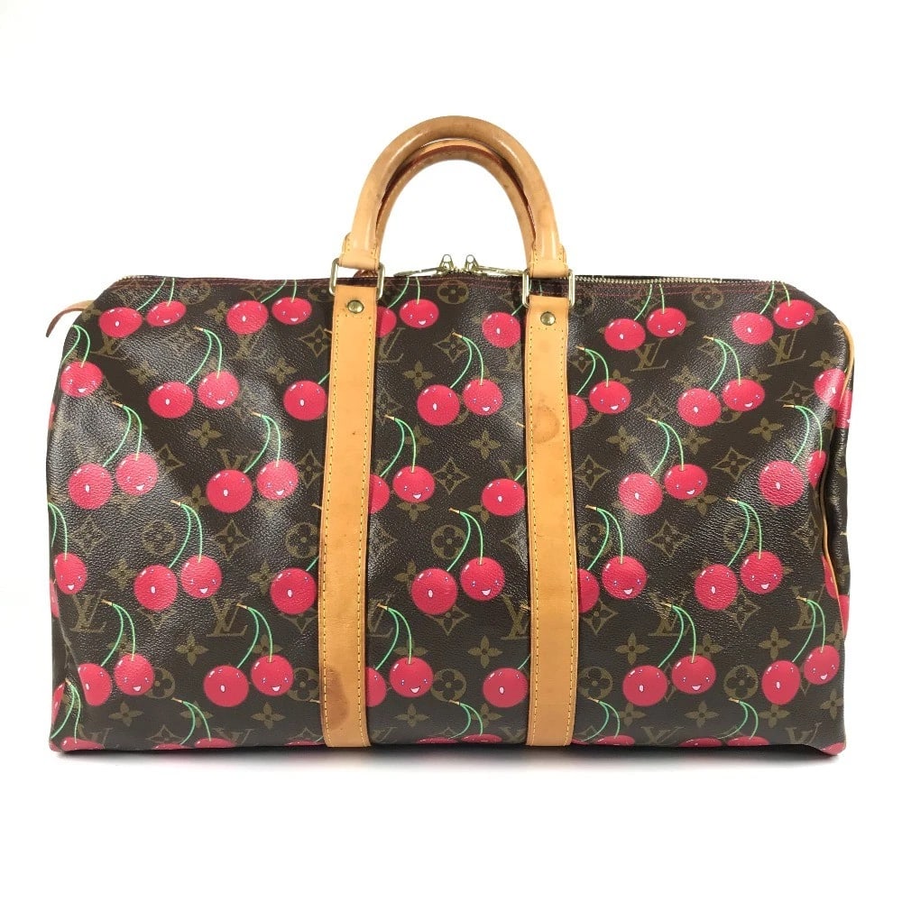 LOUIS VUITTON MONOGRAM CHERRY TAKASHI DUFFLE BAG: LOUIS VUITTON Monogram Cherry Takashi Duffle Bag Brand: Louis Vuitton Type/Style: Duffle Bag Material: Monogram CherryCanvas Color: Brown/Red Size: W17.9xH10.2xD7.9inch / W45.5cmxH26cmxD20cm