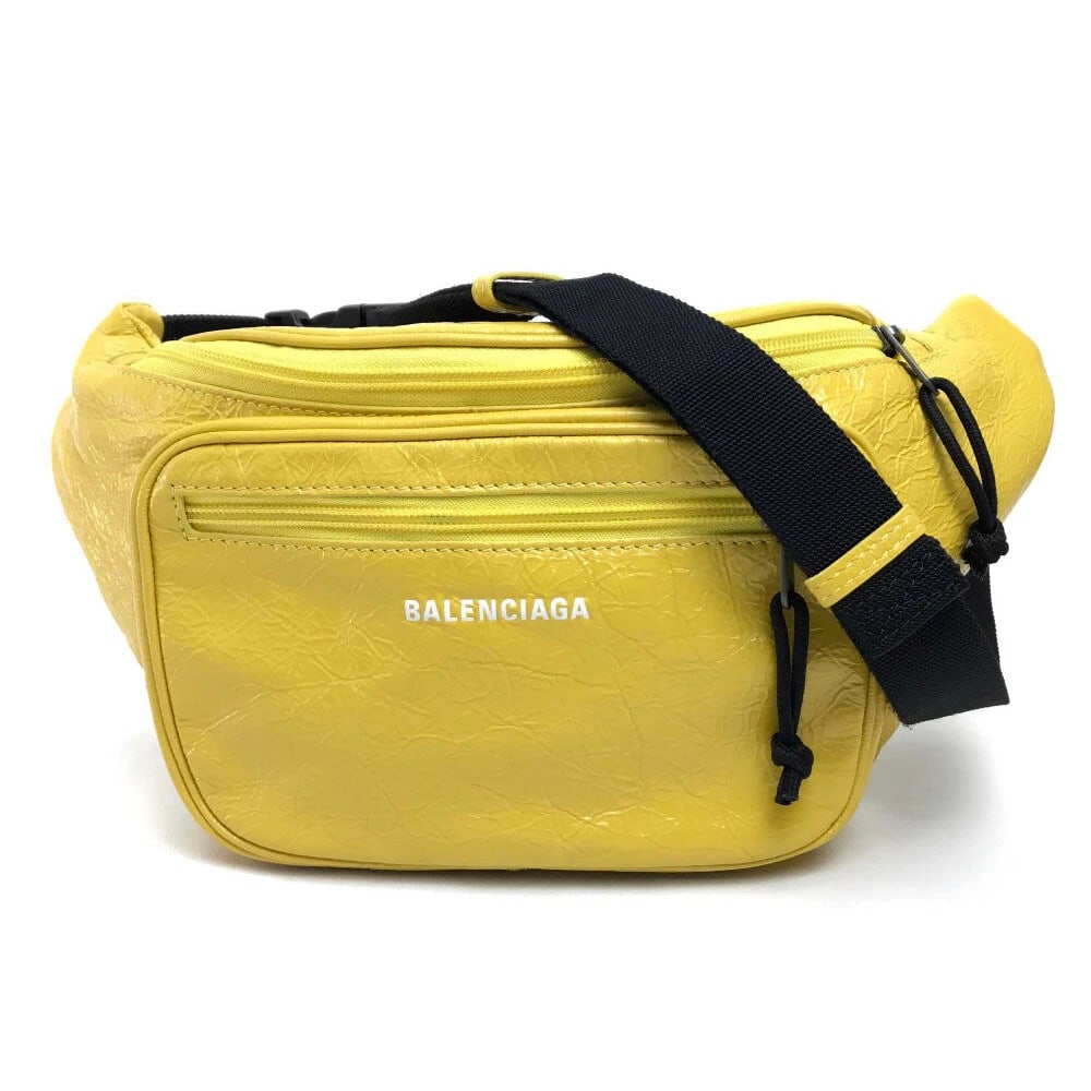 UNBALENCIAGA EXPLORER BELT PACK SHOULDER BAG: UNBALENCIAGA EXPLORER BELT PACK Shoulder Bag Brand: BALENCIAGA Type/Style: body bag Material: Leather Color: yellow Size: W7.7xH7.7inch / W19.5cmxH19.5cm Accessories: None Accessories Notice: When