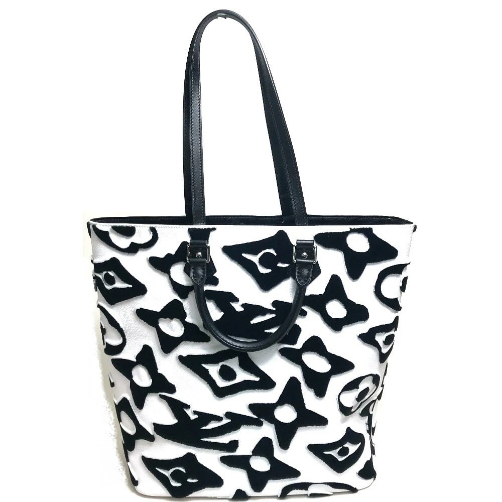 LOUIS VUITTON TUFTED MONOGRAM LVXUF CABAS HAND BAG: LOUIS VUITTON Tufted Monogram LVXUF Cabas Hand Bag Brand: LOUIS VUITTON Type/Style: Tote Bag Material: Coating Canvas Color: White / Black Size: W12.2xH14.2xD5.1inch / W31cmxH36cmxD13cm Accessorie