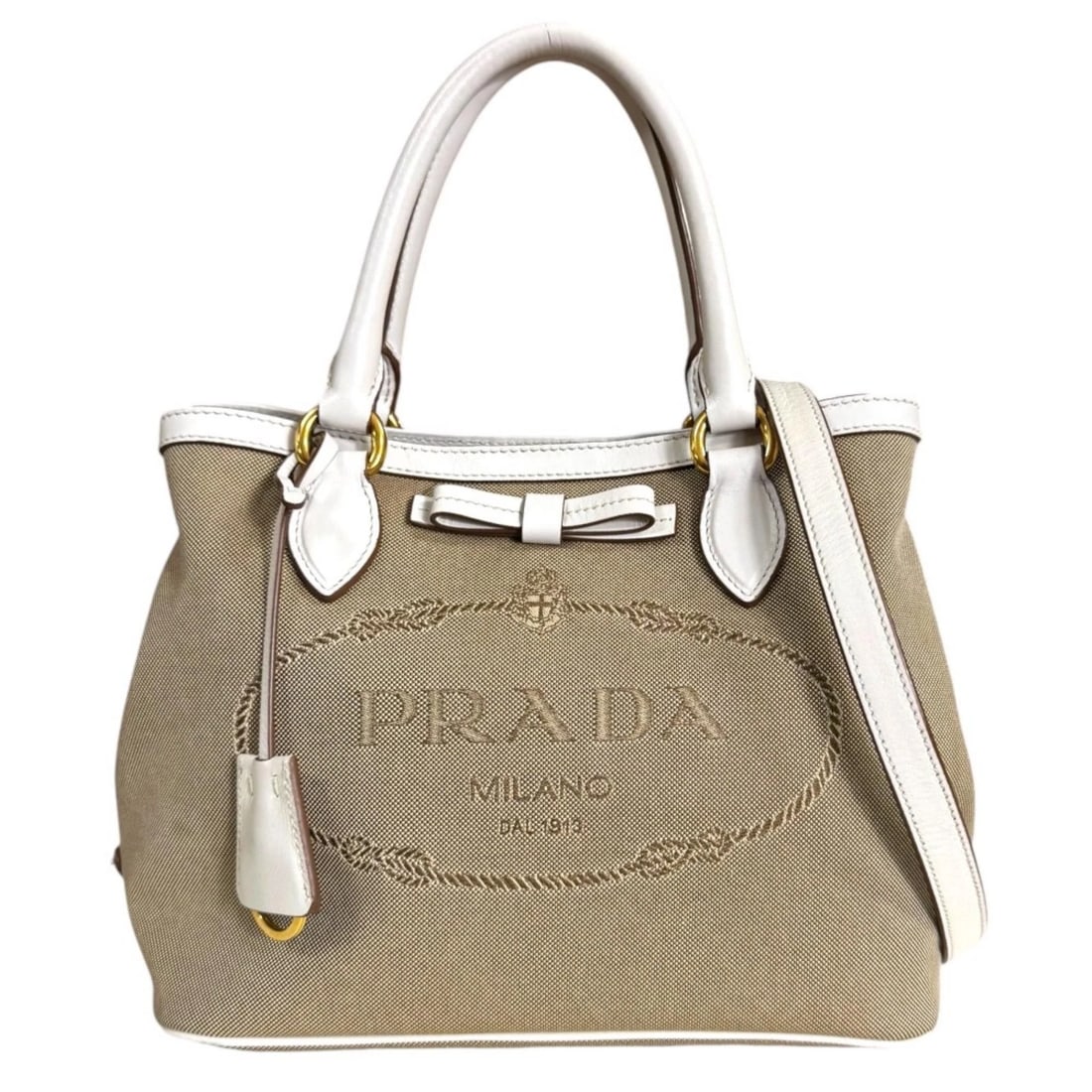 PRADA SHOULDER BAG CROSS BODY LEATHER: PRADA Shoulder Bag Cross Body leather Brand: PRADA Type/Style: Shoulder Bag Material: Exterior Material leather Color: Exterior color white Size: W9.6 x H7.9 x D5.9inch Handle:12.2inch Accessories