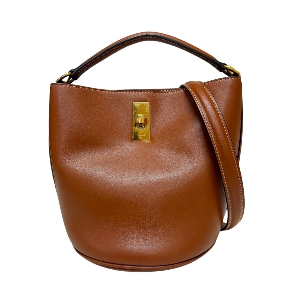 CELINE SHOULDER BAG: CELINE Shoulder Bag Brand: CELINE Type/Style: Shoulder Bag Material: Exterior Material Smooth scarf skin Color: Exterior color Tan Size: W6.3 x H6.9 x D6.1inch Handle:8.5inch Accessories: None