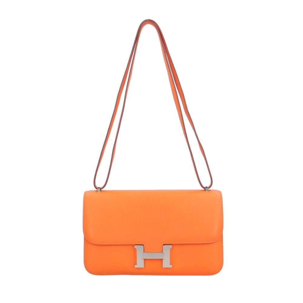 HERMES SHOULDER BAG CROSS BODY CONSTANCE: HERMES Shoulder Bag Cross Body Constance Brand: HERMES Type/Style: Shoulder Bag Material: Exterior Material Taderakto Color: Exterior color Orange Size: W9.6 x H5.9 x D1.8inch Accessories: None