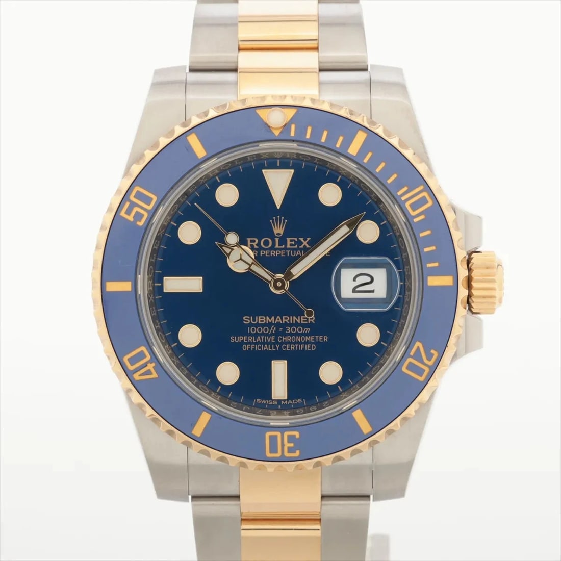 ROLEX SUBMARINER DATE AT BLUE DIAL WATCH: Rolex Submariner Date At Blue Dial Watch Brand: Rolex Type/Style: Wristwatch Material: SS?YG Color: Dial Color Blue Size: Case:W1.6 x H1.6inch / W40 x H40 Circumference of Wrist:7.1inch / 18 Acces
