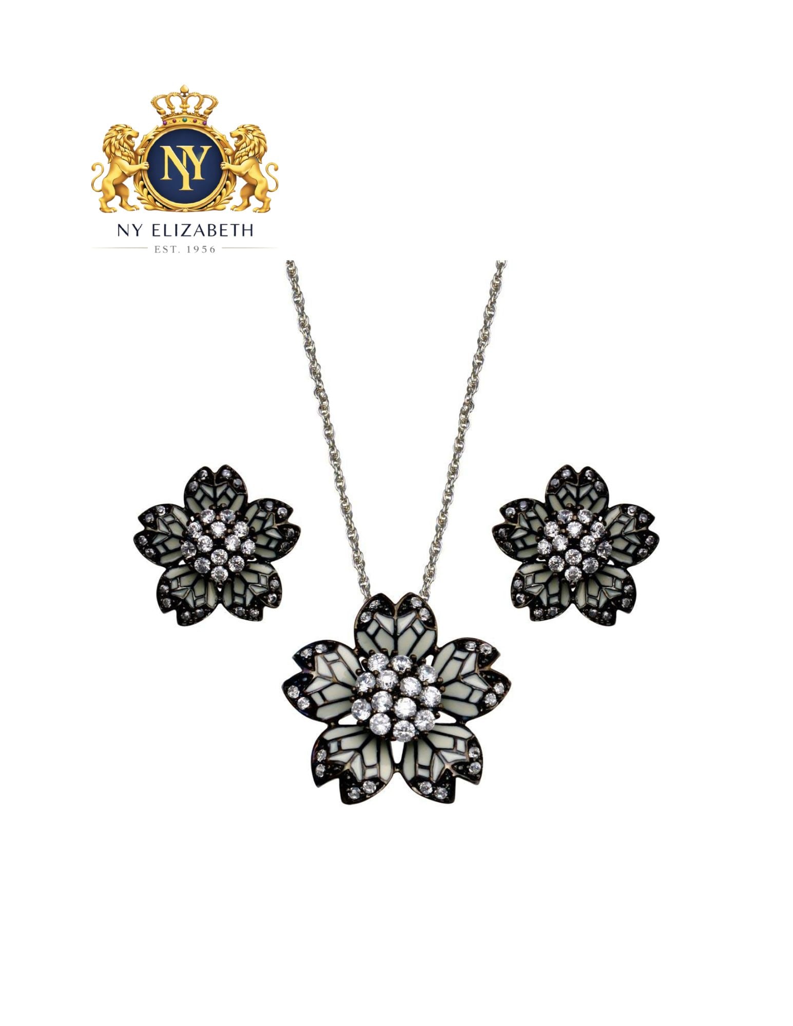 CLEARANCE-SILVER 925 BLACK RHODIUM PLATED FLOWER WHITE ENAMEL SET: Clearance-Silver 925 Black Rhodium Plated Flower White Enamel CZ Set Metal: 925 Sterling Silver Plating: Nickel Free Rhodium Plated Stone: Cubic Zirconia Dimensions: Pendant Dimensions: 22.7mm, Earrin