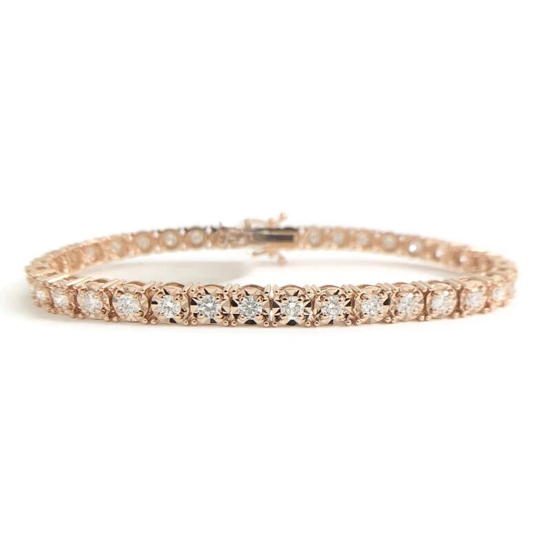 ROUND DIAMOND ILLUSION-SET TENNIS BRACELET 14K PINK ROSE GOLD: Round Diamond Illusion-Set Tennis Bracelet 14K Pink Rose Gold Brand: Salvatore & Co. Type/Style: Bracelet Material: 14K Pink Rose Gold, Main Stone Natural Color: Pink Size: Length: 7 inchesWidth: 4.5 