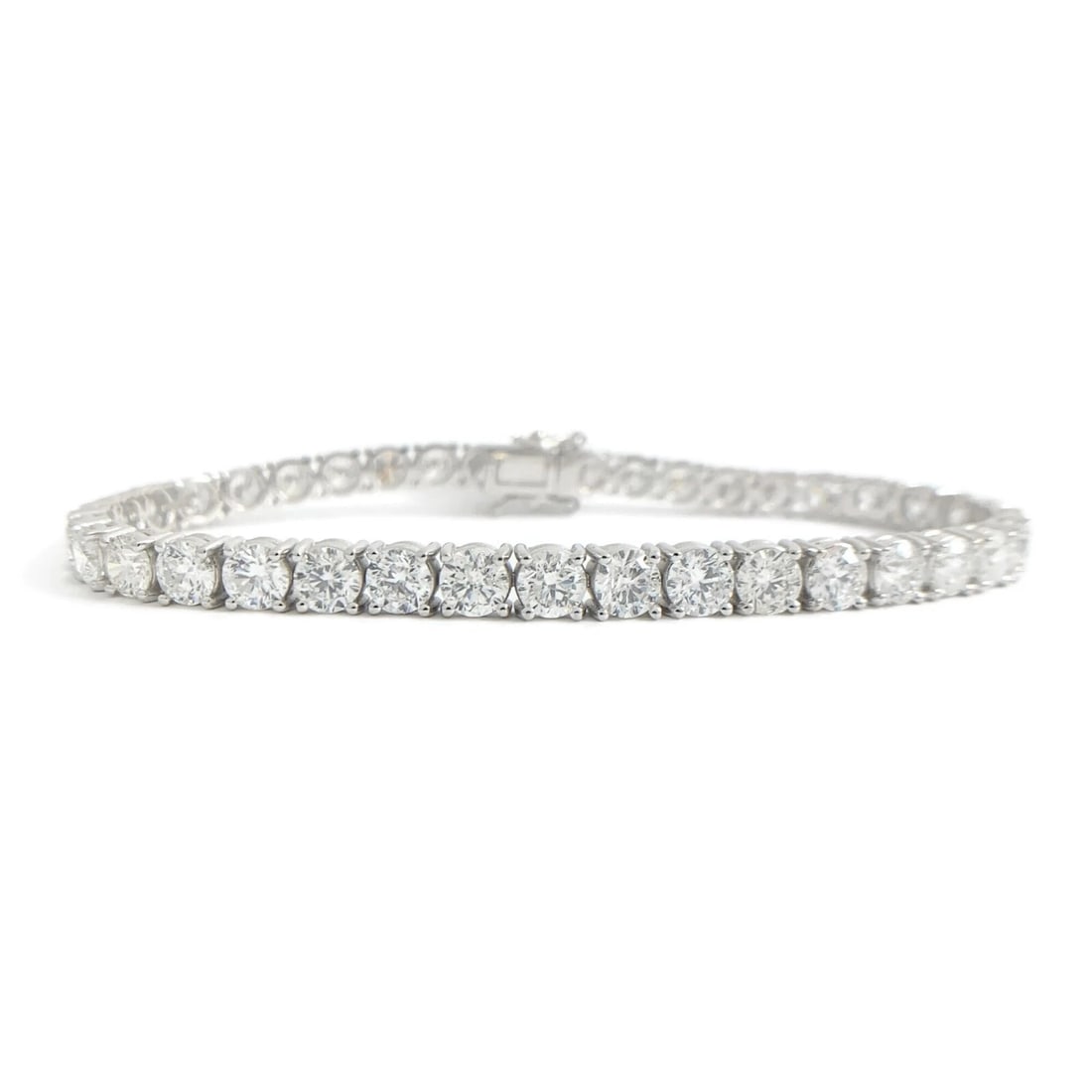 ROUND DIAMOND TENNIS BRACELET 14K WHITE GOLD: Round Diamond Tennis Bracelet 14K White Gold Brand: Salvatore & Co. Type/Style: Bracelet Material: 14K White Gold, Main Stone Natural Color: Silver Size: Length: 7 inchesWidth: 4.5 mm Accessories: