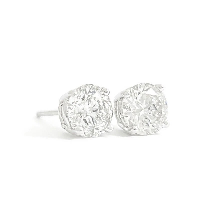 ROUND DIAMOND STUD EARRINGS 14K WHITE GOLD: Round Diamond Stud Earrings 14K White Gold Brand: Unbranded Type/Style: Earrings Material: 14K White Gold, Main Stone Natural Color: Silver Size: Measurements: 5.7 mm Accessories: None Acc