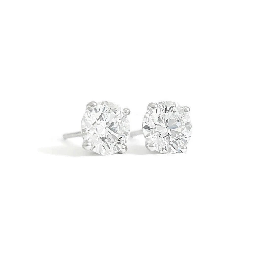 ROUND DIAMOND STUD EARRINGS 14K WHITE GOLD: Round Diamond Stud Earrings 14K White Gold Brand: Unbranded Type/Style: Earrings Material: 14K White Gold, Main Stone Natural Color: White Size: Measurements: 6.1 mm Accessories: None Acce