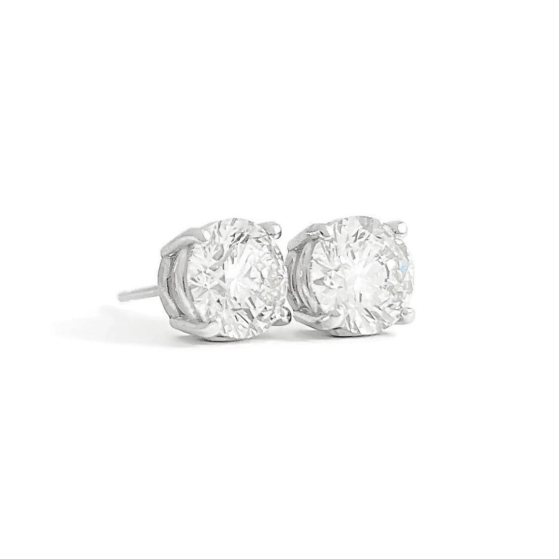 ROUND DIAMOND STUD EARRINGS 14K WHITE GOLD: Round Diamond Stud Earrings 14K White Gold Brand: Unbranded Type/Style: Earrings Material: 14K White Gold, Main Stone Natural Color: White Size: Measurements: 6.5 mm - 6.6 mm Accessories: None