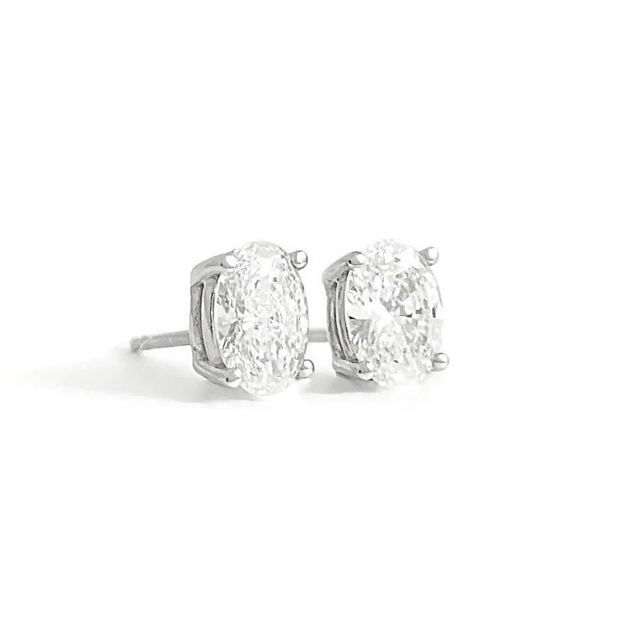 OVAL LAB-CREATED DIAMOND STUD EARRINGS 14K WHITE GOLD: Oval Lab-Created Diamond Stud Earrings 14K White Gold Brand: Unbranded Type/Style: Earrings Material: 14K White Gold, Main Stone Lab-Created Color: White Size: Measurements: 6.5 mm x 4.5 mm Access
