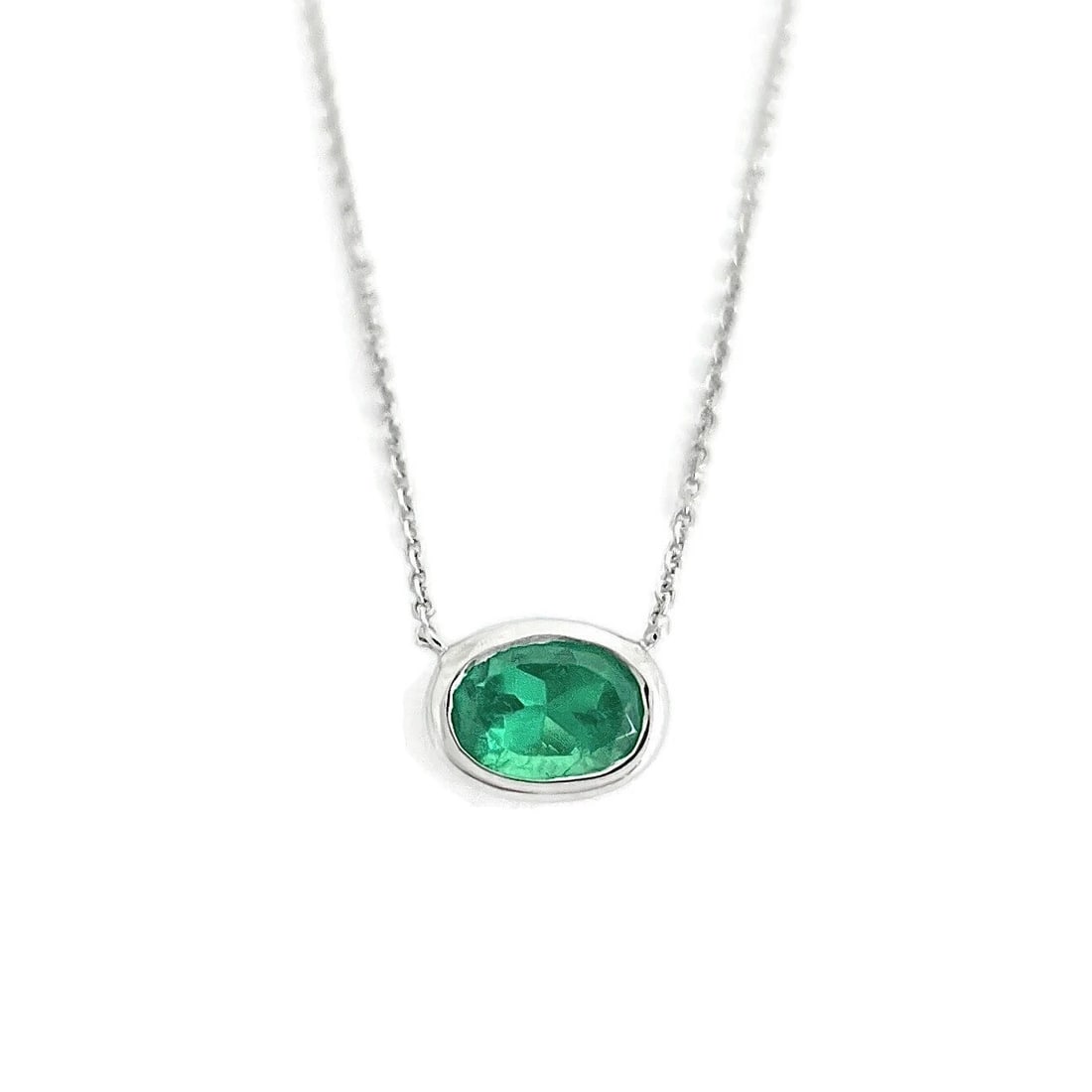 OVAL GREEN EMERALD GEMSTONE SOLITAIRE PENDANT NECKLACE 14K WHITE GOLD: Oval Green Emerald Gemstone Solitaire Pendant Necklace 14K White Gold Brand: Salvatore & Co. Type/Style: Necklace Material: 14K White Gold, Main Stone Natural Color: Green Size: Length: 16 inches Pend