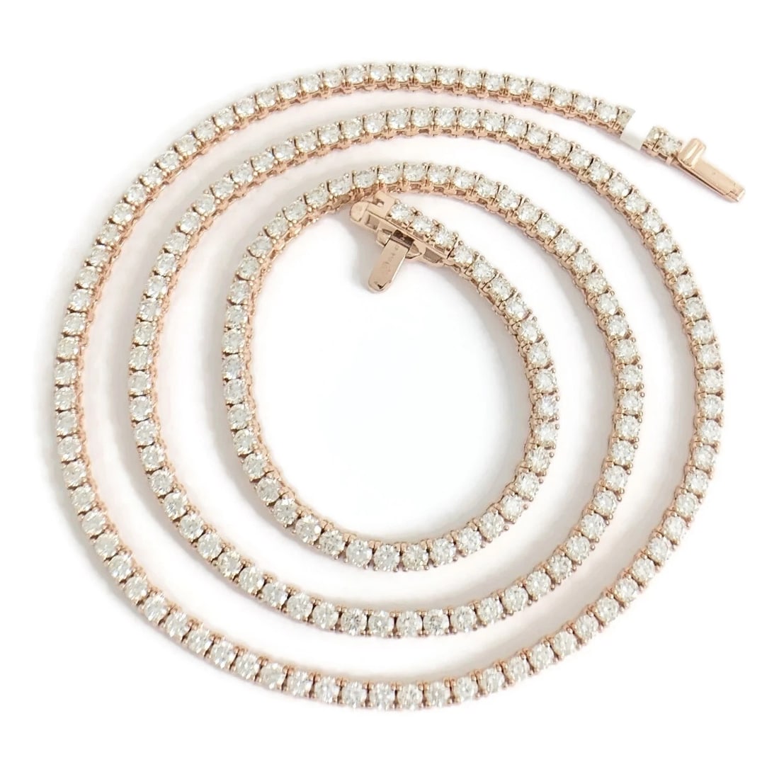 THIN DIAMOND TENNIS NECKLACE 14K PINK ROSE GOLD: Thin Diamond Tennis Necklace 14K Pink Rose Gold Brand: Salvatore & Co. Type/Style: Necklace Material: 14K Pink Rose Gold, Main Stone Natural Color: Pink Size: Length: 18 inchesWidth: 2.7 mm Access