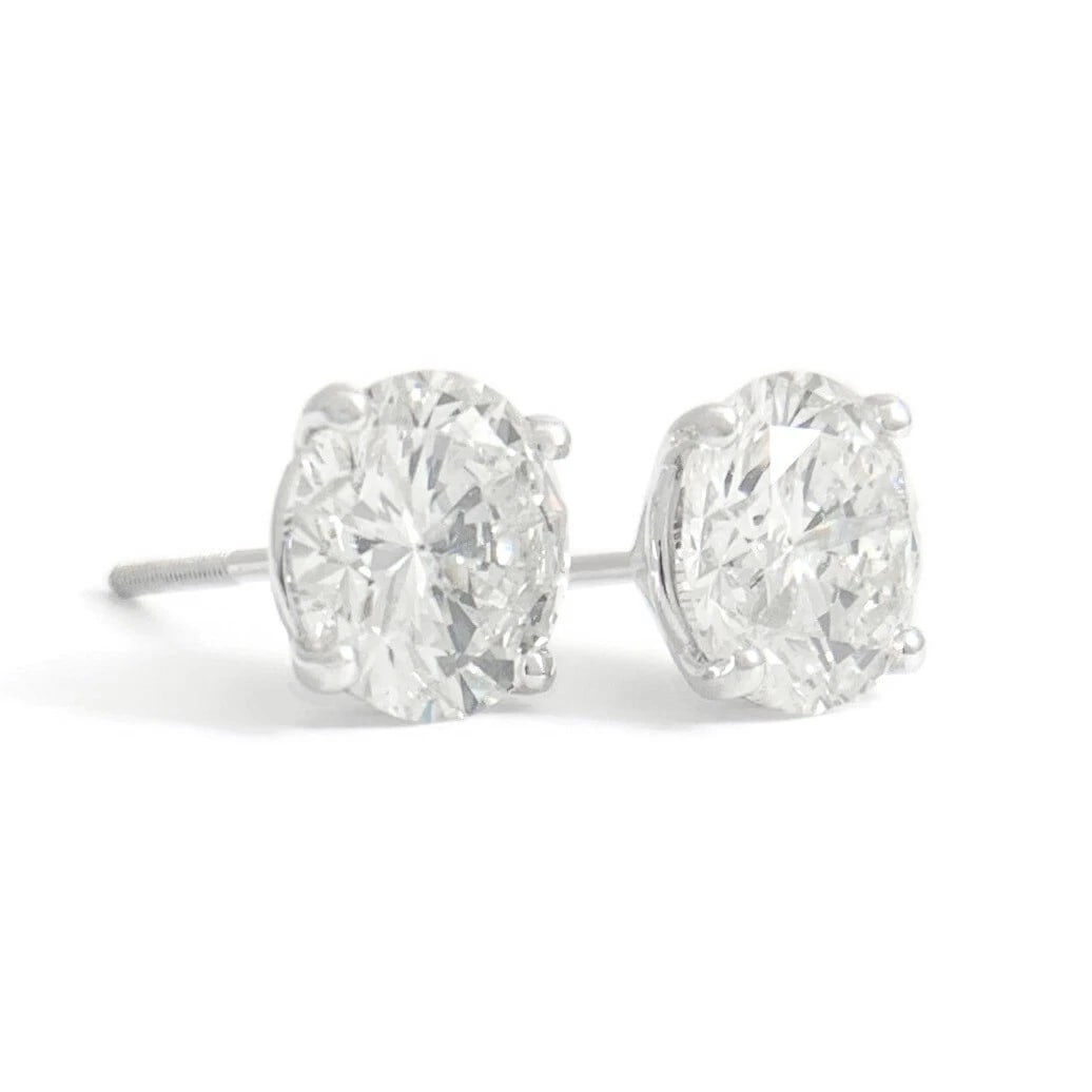 ROUND DIAMOND STUD EARRINGS 14K WHITE GOLD: Round Diamond Stud Earrings 14K White Gold Brand: Salvatore & Co. Type/Style: Earrings Material: 14K White Gold, Main Stone Natural Color: Silver Size: Measurements: 7.2 mm - 7.3 mm Accessories: N