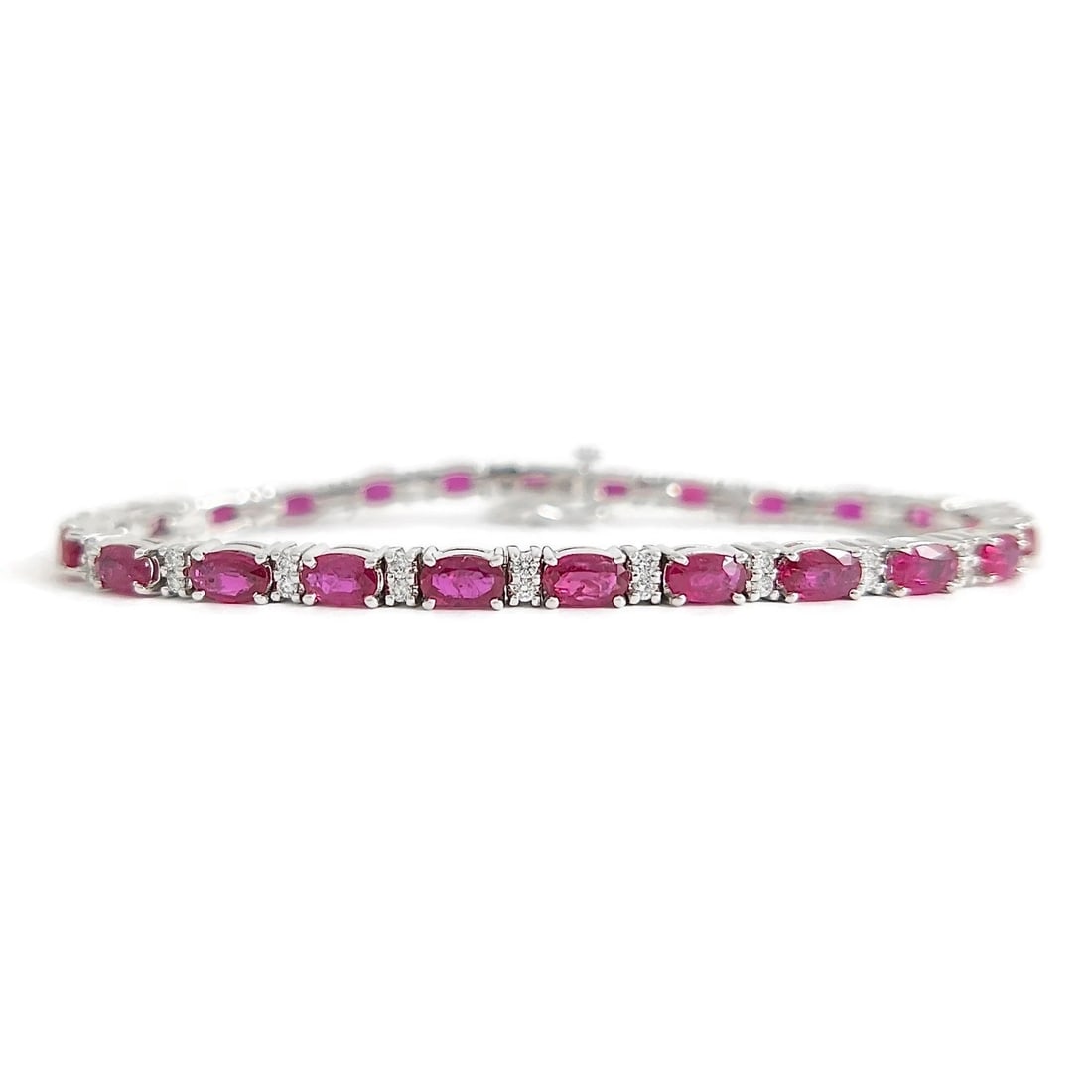 OVAL RUBY DIAMOND GEMSTONE TENNIS BRACELET 14K WHITE GOLD: Oval Ruby Diamond Gemstone Tennis Bracelet 14K White Gold Brand: Unbranded Type/Style: Bracelet Material: 14K White Gold, Main Stone Natural Color: Red Size: Length: 6.75 inchesWidth: 3.5 mm Acces