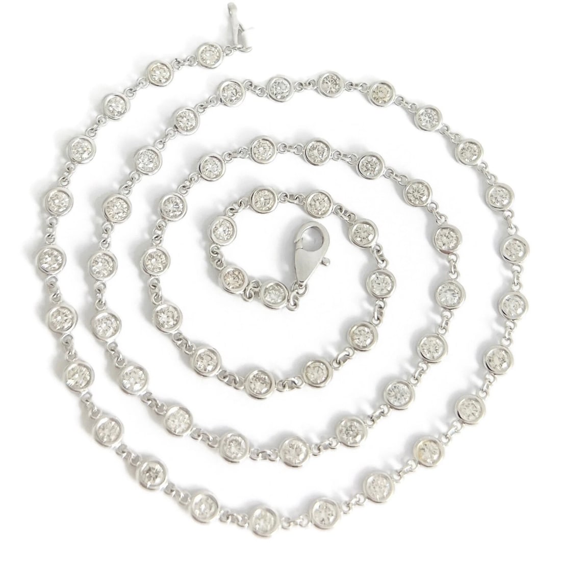 DIAMOND BEZEL STATION STRAND NECKLACE 14K WHITE GOLD: Diamond Bezel Station Strand Necklace 14K White Gold Brand: Salvatore & Co. Type/Style: Necklace Material: 14K White Gold, Main Stone Natural Color: Silver Size: Length: 18 inchesWidth: 4 mm