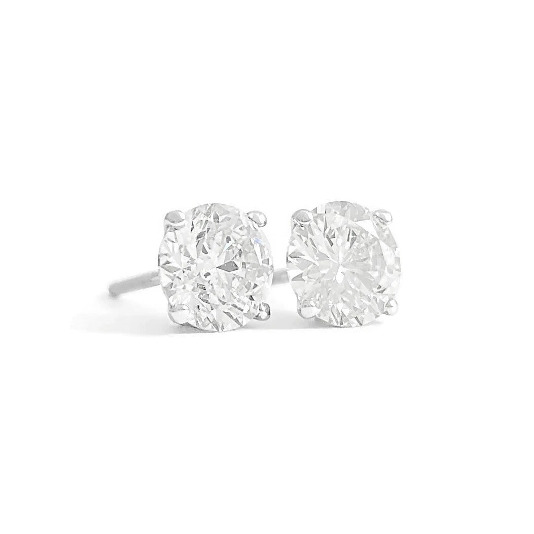 ROUND DIAMOND STUD EARRINGS 14K WHITE GOLD: Round Diamond Stud Earrings 14K White Gold Brand: Unbranded Type/Style: Earrings Material: 14K White Gold, Main Stone Natural Color: White Size: Measurements: 7.3 mm - 7.4 mm Accessories: None
